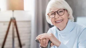 smiling elderly woman and Aging in place resources for senior home safety