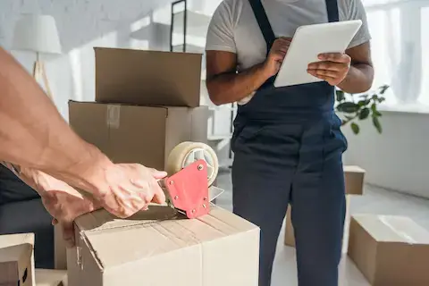 senior moving services packing up boxes - find these resources and more at Thrive @ Home Network